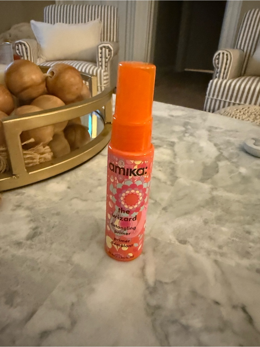 amika The Wizard Detangling Primer — Bright Orange Spray Bottle